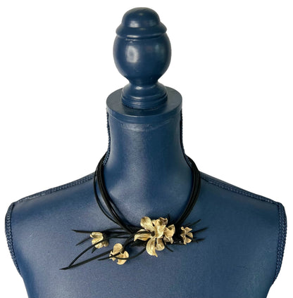 Elizabeth Flower Leather Necklace with matching gold bracelet